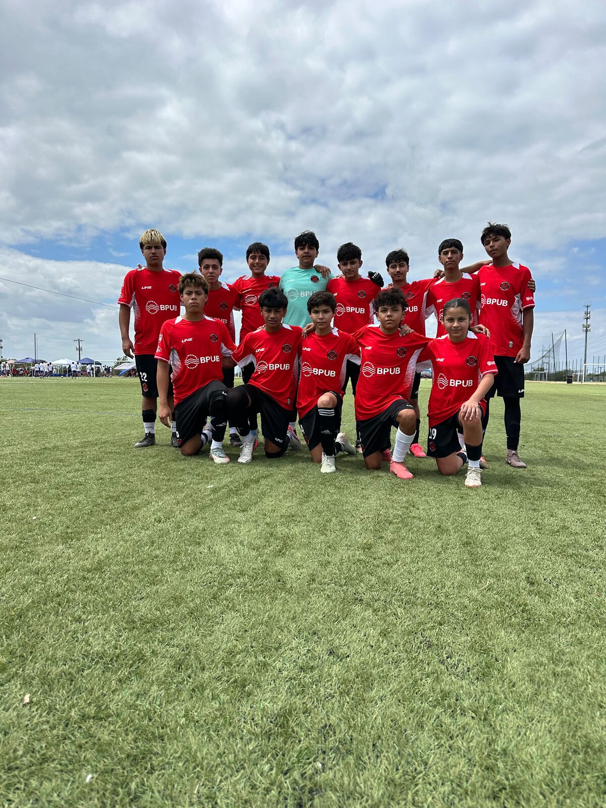 Academy team in red kits